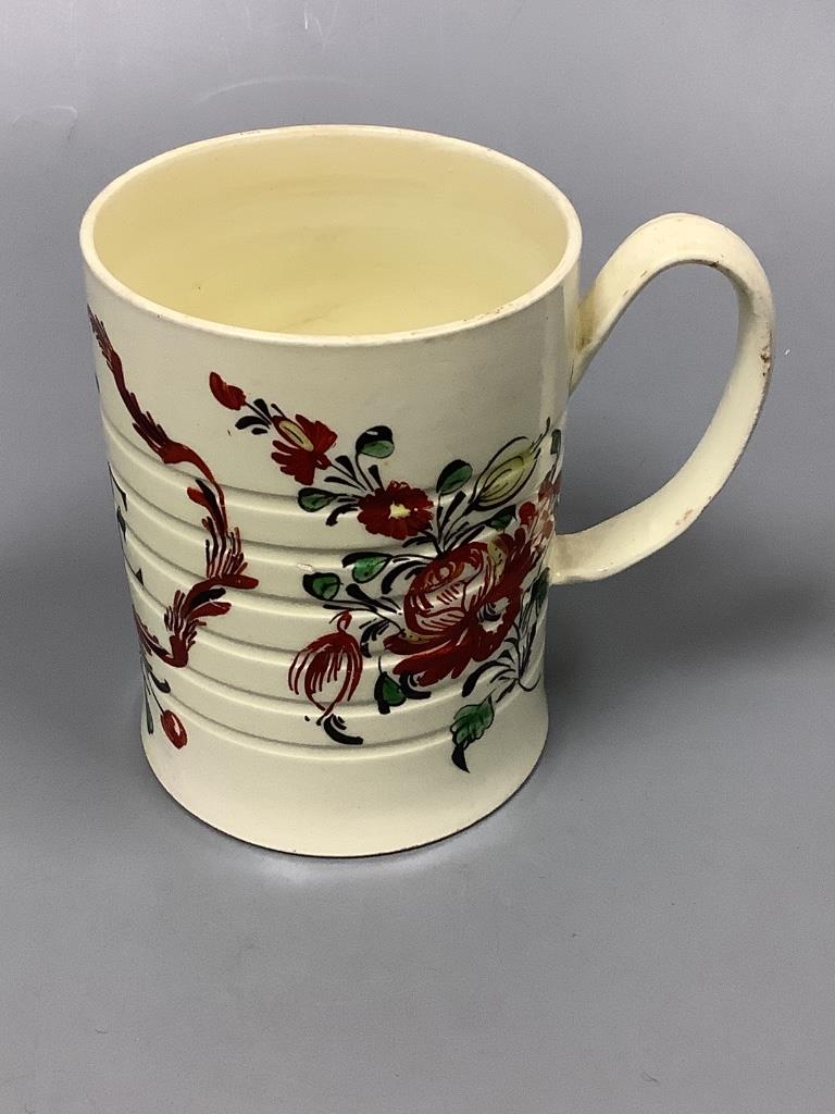 A creamware ‘ALE’ mug, c.1780, height 9.5cm